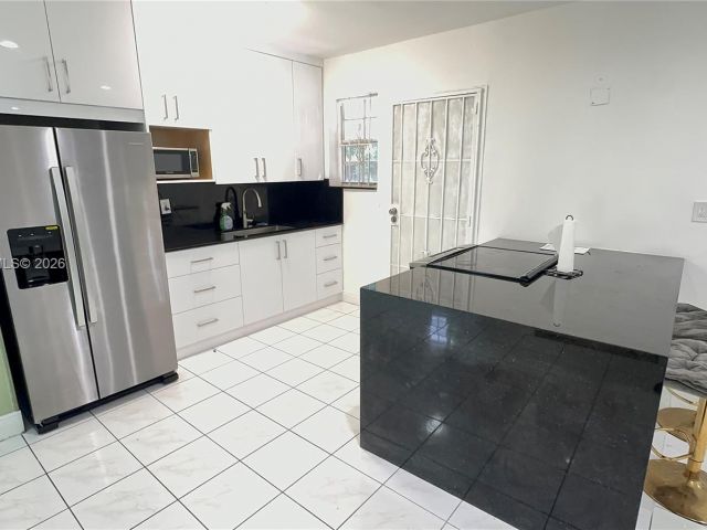 Home for rent at 110 NW 198th St - photo 7480402