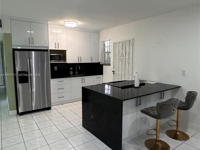 Home for rent at 110 NW 198th St - photo 7480404