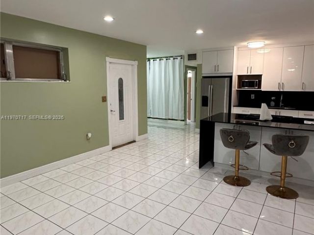 Home for rent at 110 NW 198th St - photo 7480405