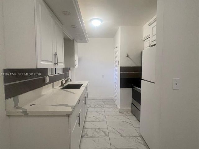 Home for rent at 121 NE 169th Ter - photo 7481313