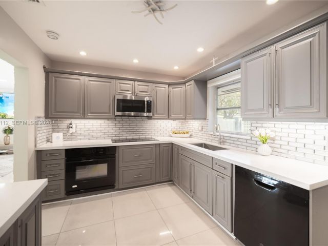 Home for sale at 2121 NE 62nd St - photo 7482370