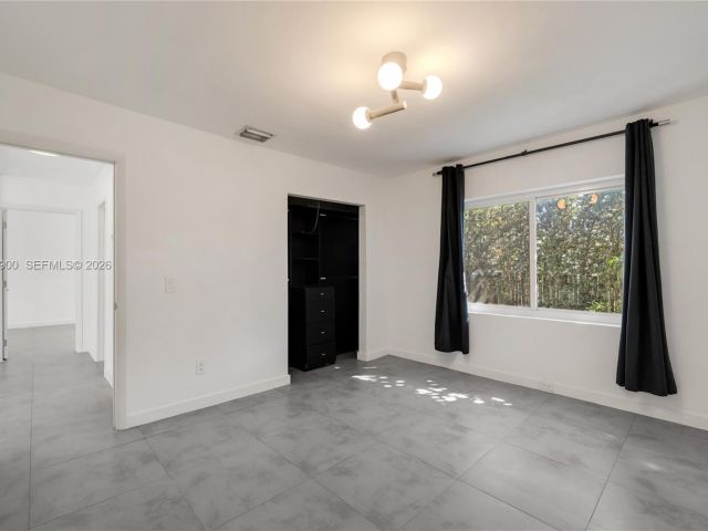 Home for rent at 801 NE 118th St - photo 7504756