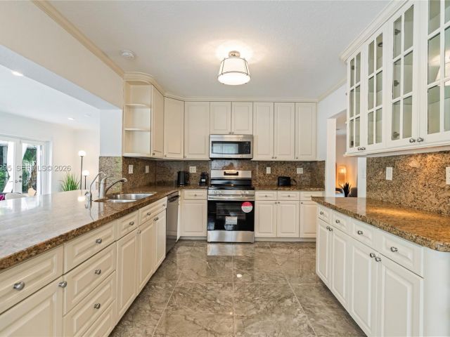 Home for sale at 5900 NE 15th Ave - photo 7483184