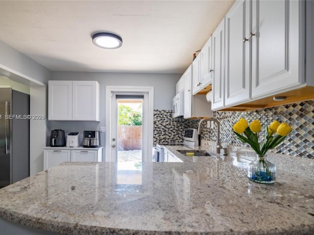 Home for sale at 2950 NE 11th Ave - photo 7478683