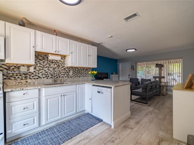 Home for sale at 2950 NE 11th Ave - photo 7478685