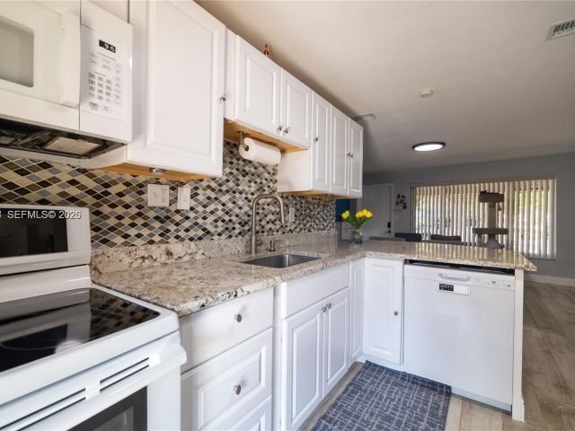 Home for sale at 2950 NE 11th Ave - photo 7478686