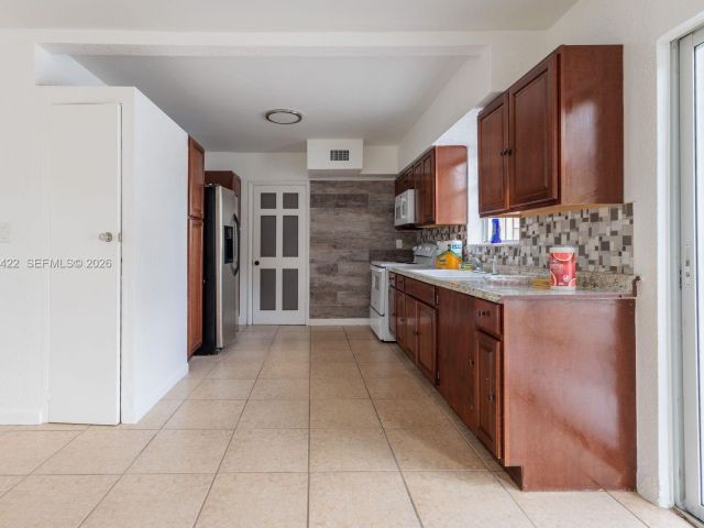 Home for rent at 1301 NE 153rd St - photo 7481345