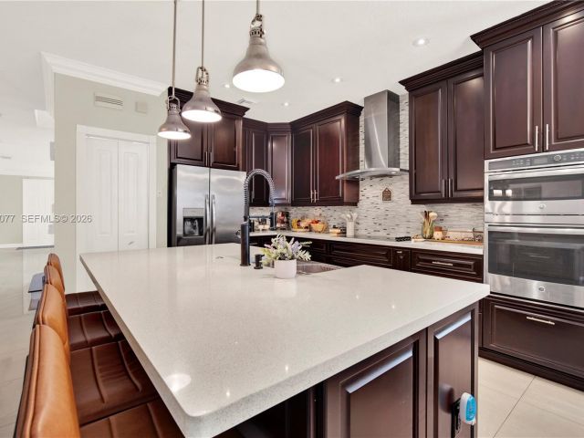 Home for sale at 144 NE 32nd Ter - photo 7460505