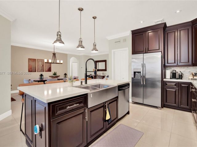 Home for sale at 144 NE 32nd Ter - photo 7460506