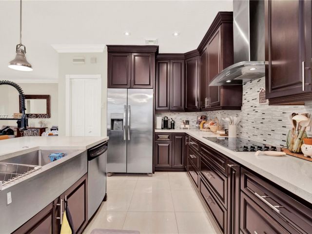 Home for sale at 144 NE 32nd Ter - photo 7460507