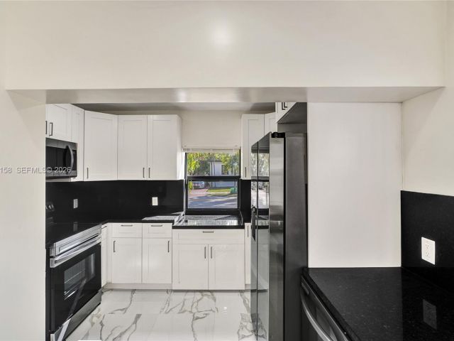 Home for rent at 237 NE 110th Ter 237 - photo 7518175