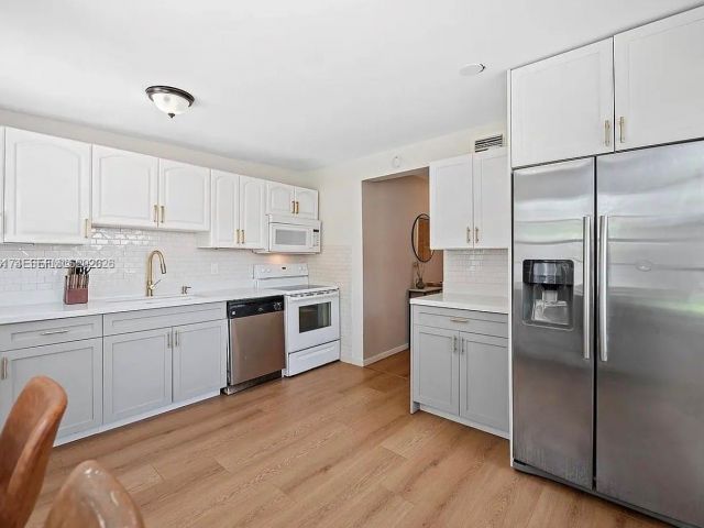 Home for rent at 1480 SW 26th Ave - photo 7513108