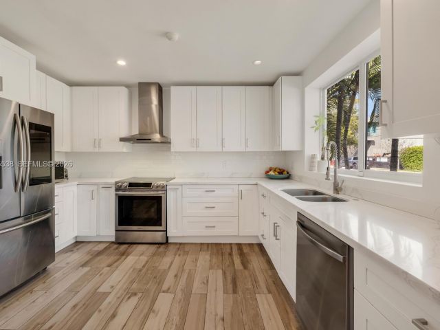 Home for sale at 7630 NE 8th Ave - photo 7521563