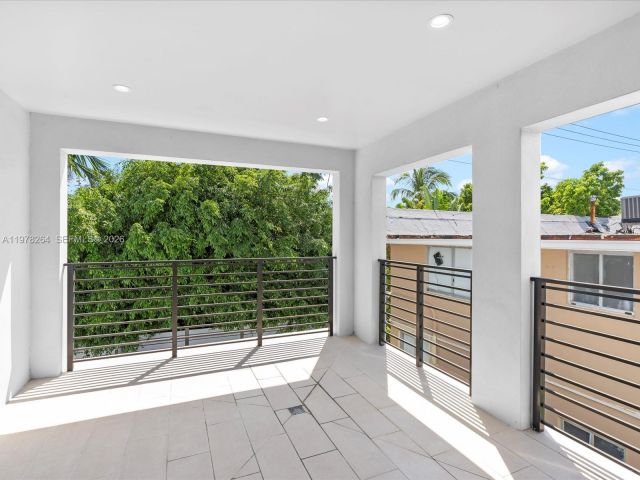 Home for rent at 1134 71st St 1 - photo 7469001