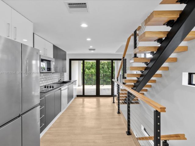 Home for rent at 1134 71st St 1 - photo 7469010