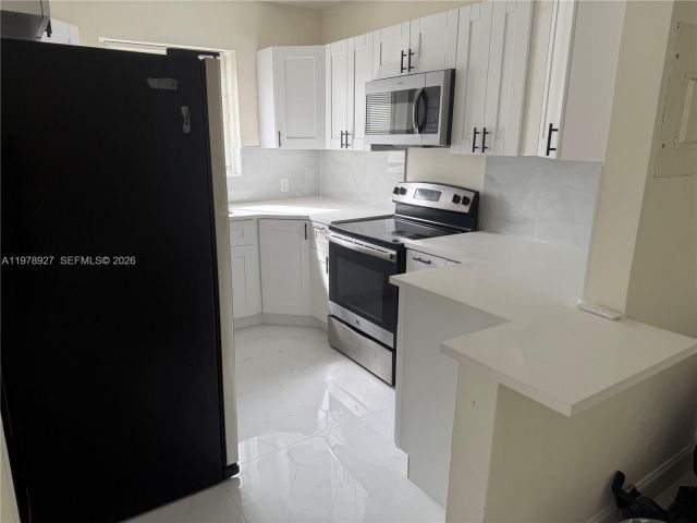 Home for sale at 911 NW 45th St - photo 7517768