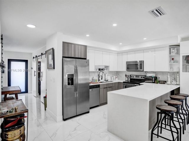 Home for rent at 3648 NE 167th St 27 - photo 7480981