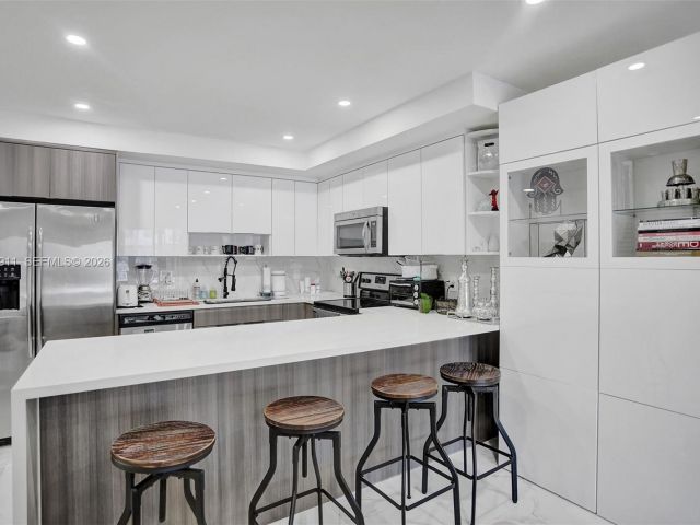 Home for rent at 3648 NE 167th St 27 - photo 7480983