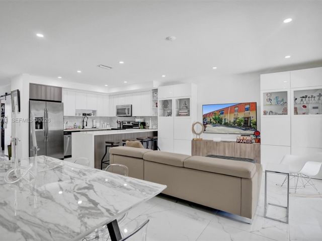 Home for rent at 3648 NE 167th St 27 - photo 7480986