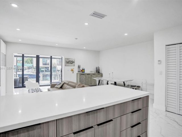 Home for rent at 3648 NE 167th St 27 - photo 7480990