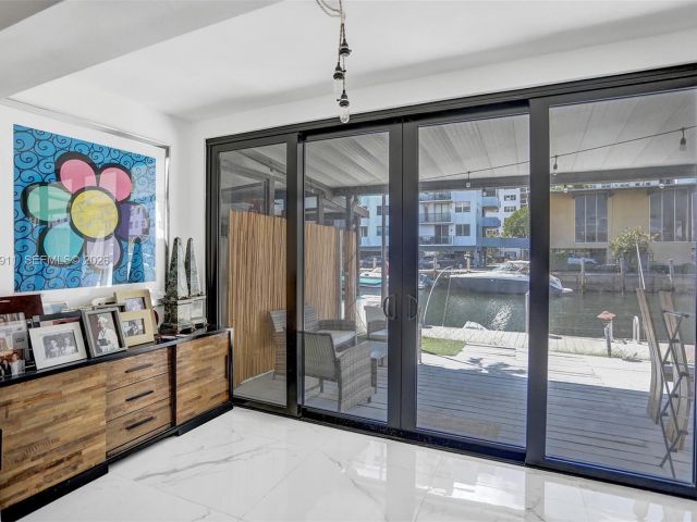 Home for rent at 3648 NE 167th St 27 - photo 7480992