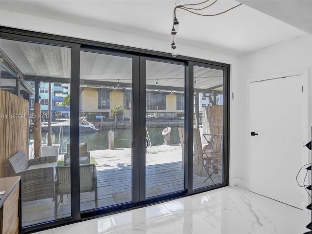 Home for rent at 3648 NE 167th St 27 - photo 7480993