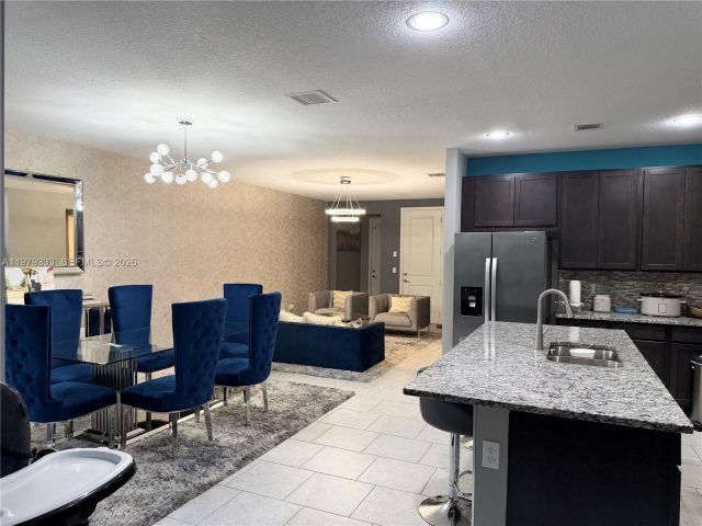 Home for rent at 445 NW 36th Ave - photo 7478507