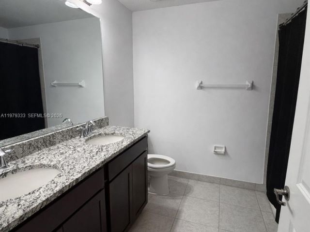 Home for rent at 445 NW 36th Ave - photo 7478519