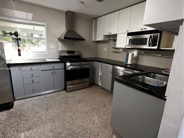 Home for rent at 1561 NE 29th St - photo 7478437