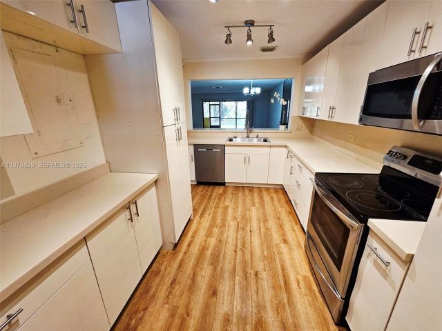 Home for rent at 3950 ESTEPONA AVE 6-D-6 - photo 7484959