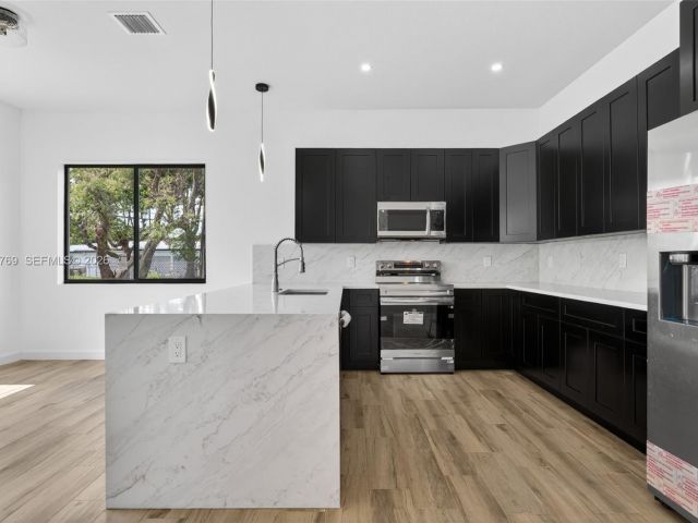 Home for sale at 3040 NW 24th St - photo 7482501