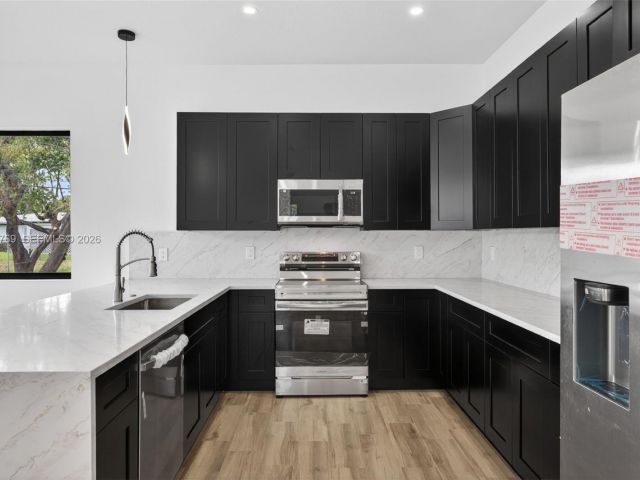 Home for sale at 3040 NW 24th St - photo 7482503