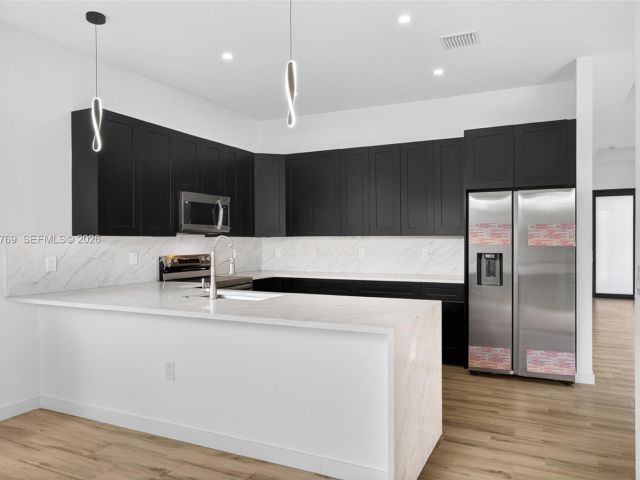 Home for sale at 3040 NW 24th St - photo 7482506