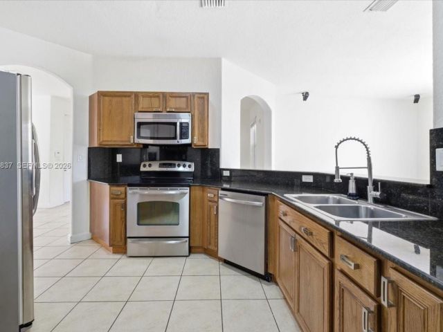 4-bedroom home for sale in Doral - 8730 NW 110th Ave - MondialRealty