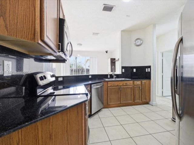 4-bedroom home for sale in Doral - 8730 NW 110th Ave - MondialRealty