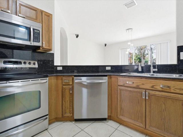 4-bedroom home for sale in Doral - 8730 NW 110th Ave - MondialRealty