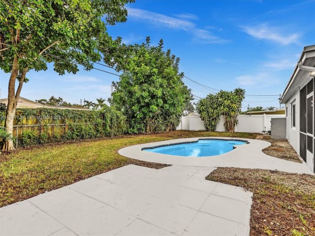 Home for rent at 6800 Raleigh St - photo 7473105