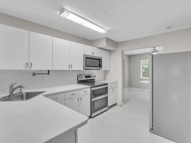 Home for rent at 6800 Raleigh St - photo 7473118