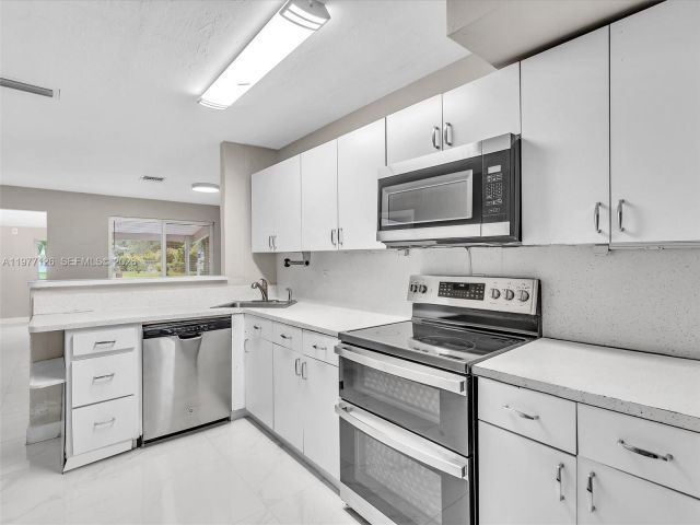 Home for rent at 6800 Raleigh St - photo 7473120