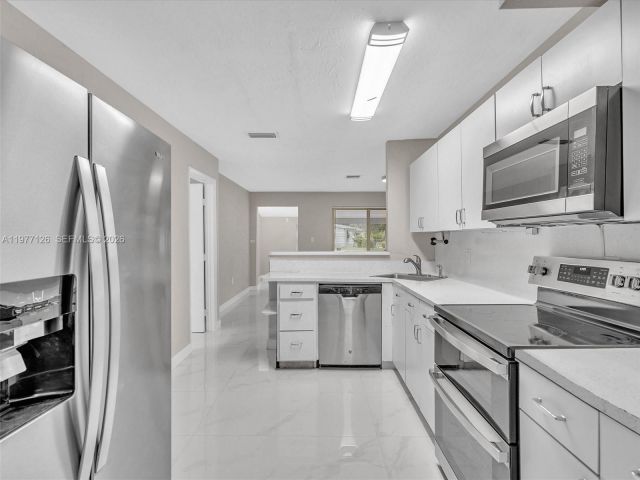 Home for rent at 6800 Raleigh St - photo 7473121