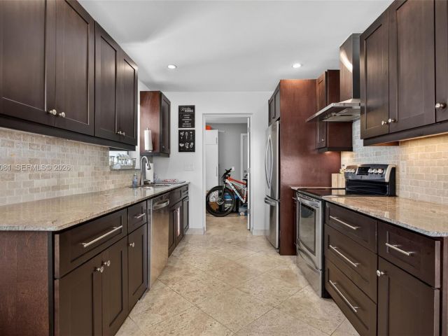 Home for sale at 2136 NE 56th Pl - photo 7481897