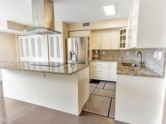 Home for rent at 2421 NE 10th St 153 - photo 7462017