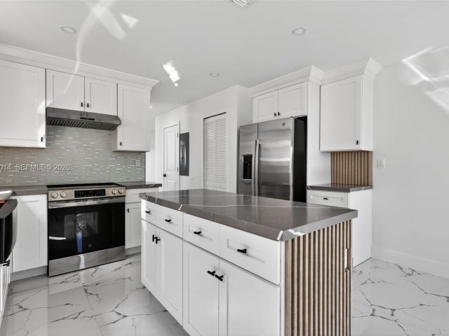 Home for sale at 4311 NW 32nd Ave - photo 7514997