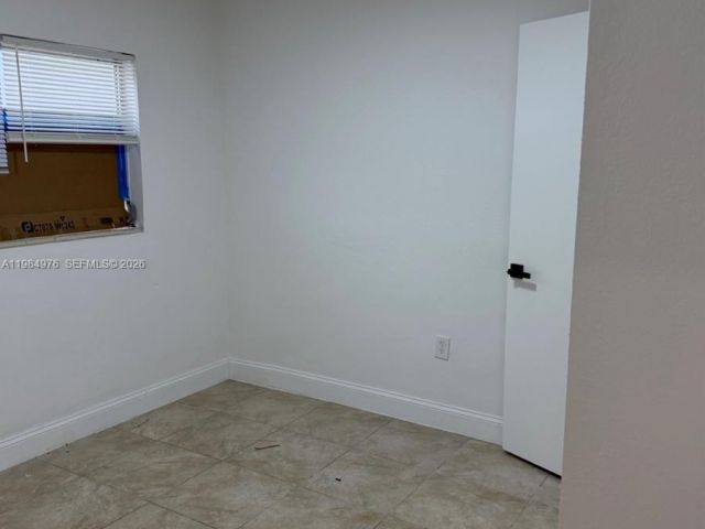 Home for rent at 2335 NW 68th St 1 FRONT - photo 7463346