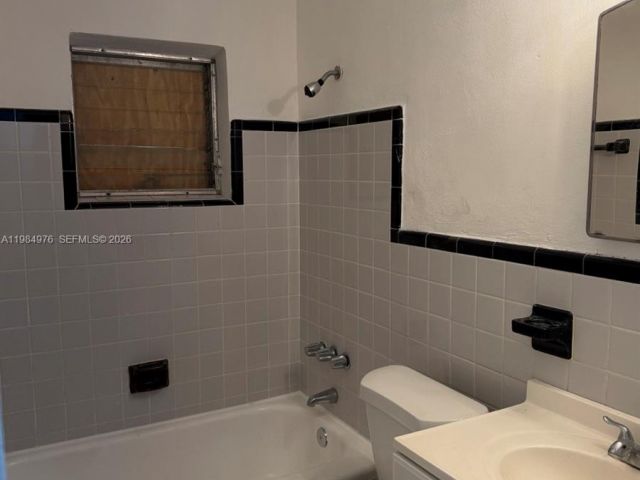 Home for rent at 2335 NW 68th St 1 FRONT - photo 7463348