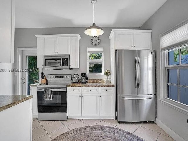 Home for sale at 8900 Harding Ave - photo 7466977