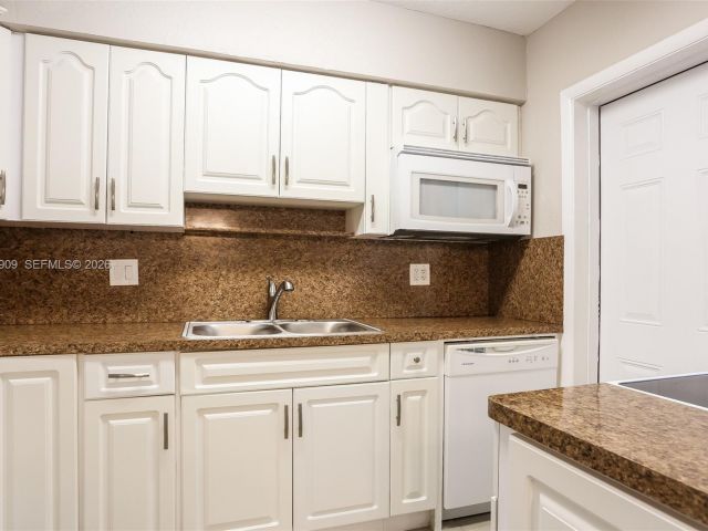 Home for rent at 1078 NE 157th St - photo 7480533