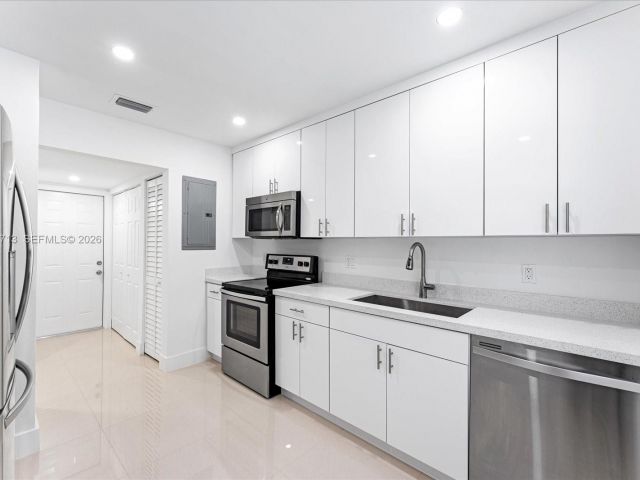 Home for rent at 3619 S Le Jeune Rd 1 - photo 7519568