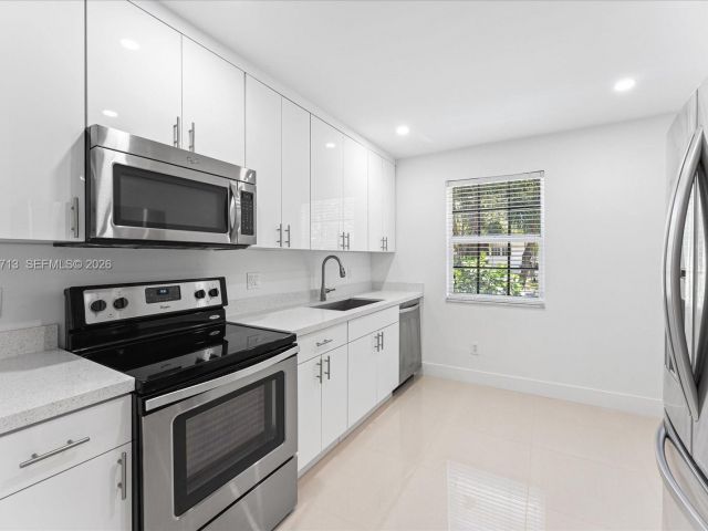 Home for rent at 3619 S Le Jeune Rd 1 - photo 7519569