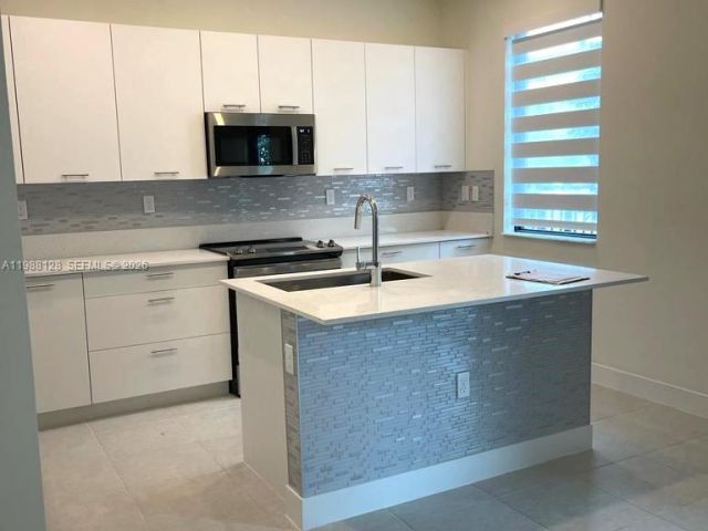 Home for rent at 4227 NW 83rd Ave - photo 7519779